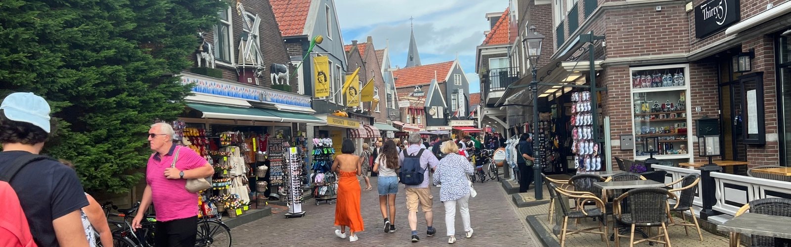 Walking along the charming streets of the Old Harbour in Volendam.