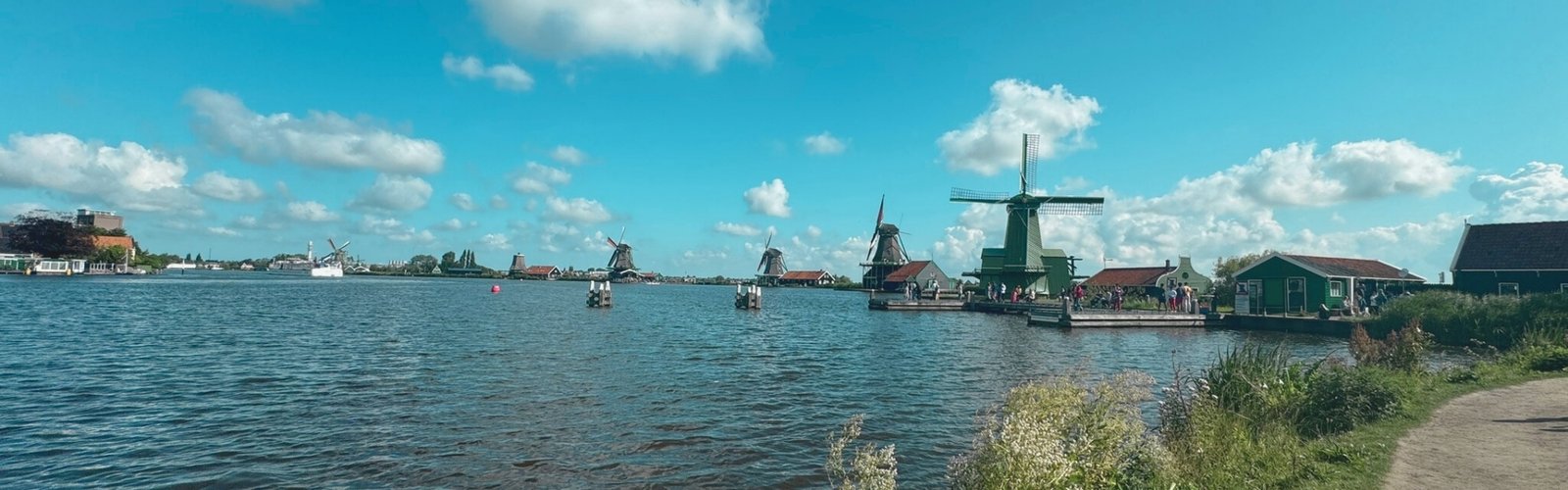Scenic waterfront with traditional Dutch windmills view